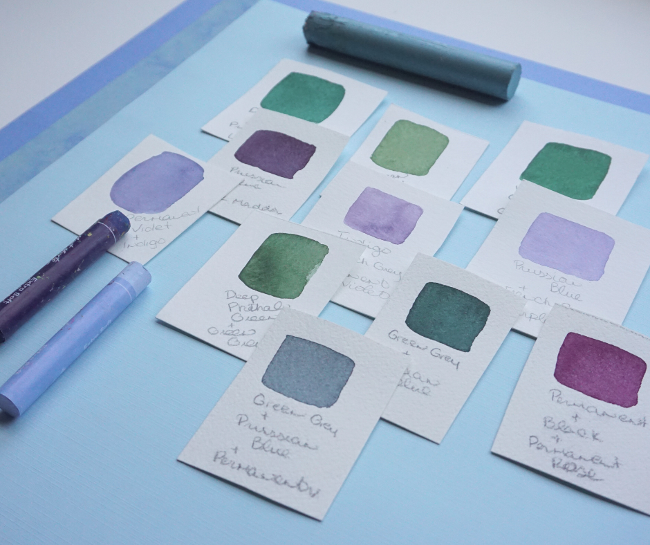 artist table with individual rectangular color swatches showing the relationship of various shades of blue and green